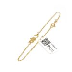 Pulsera de oro para mujer 18k diseño mallorquina con dije niño seguro resorte