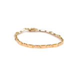Pulsera de oro para mujer 18K articulada con partes arenadas seguro cajon doble