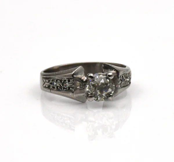 Anillo de oro para mujer 18k diseño solitario con 1 diamante y 4 circones pequeños transparentes
